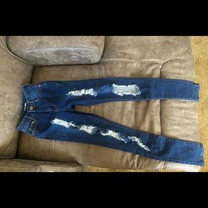 dark blue ripped jeans